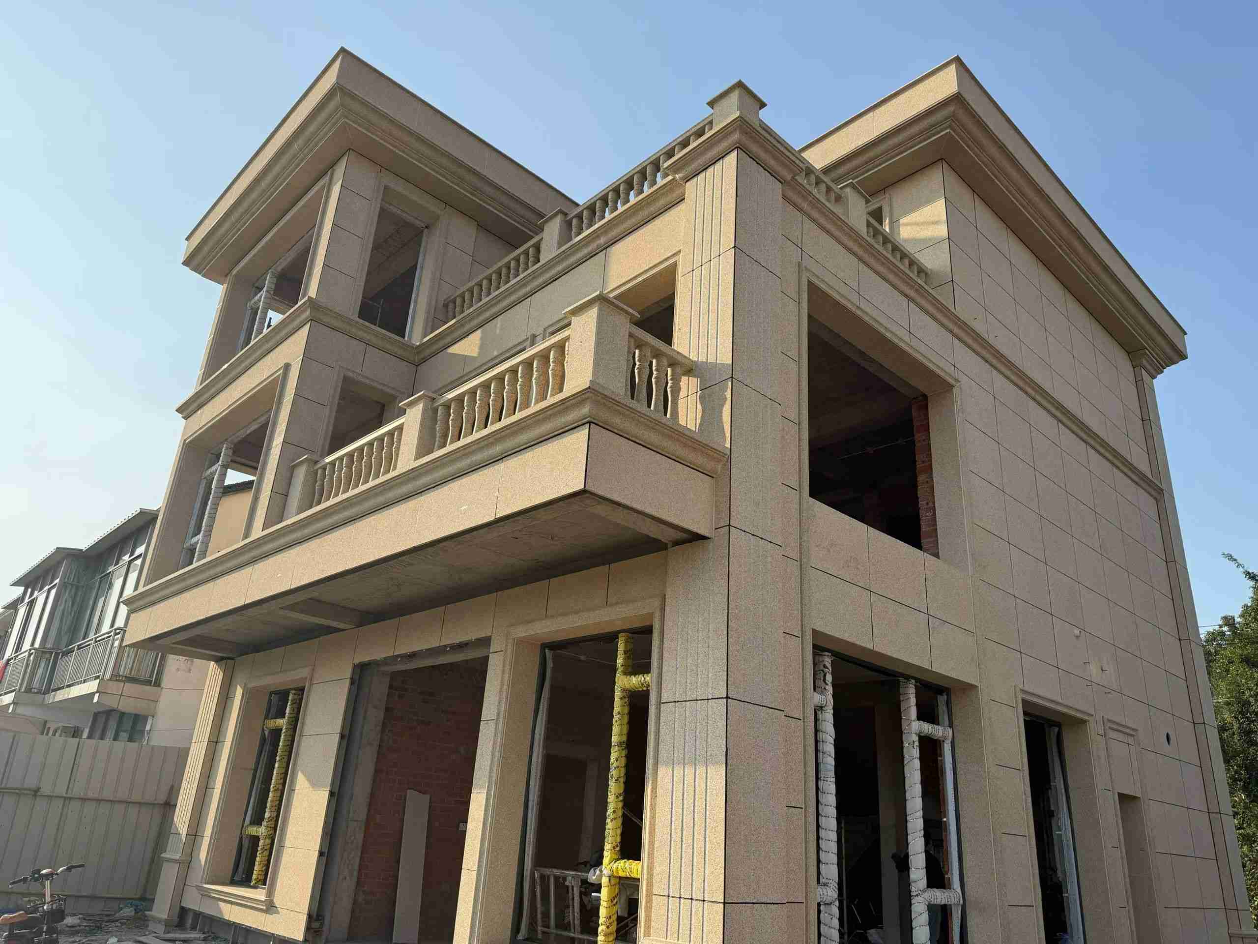 广东 黄金麻花岗岩石材荔枝面外墙干挂效果展示