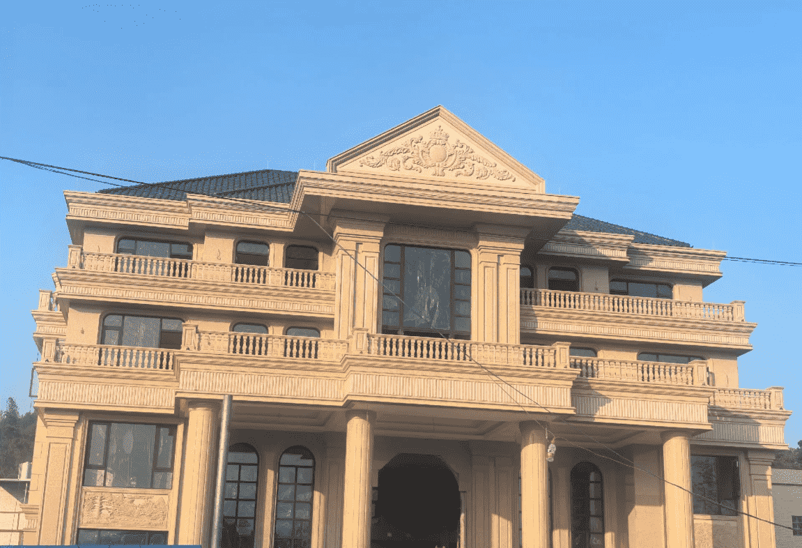 广东黄金麻别墅外墙干挂石材效果示例